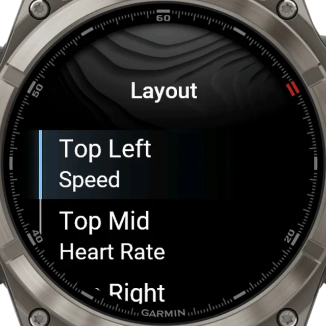 Garmin watch showing the Surfr layout settings, assigning speed to the top-left slot and heart rate to the top-middle slot